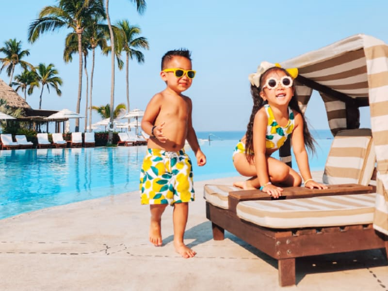 Childrens playing near the pool